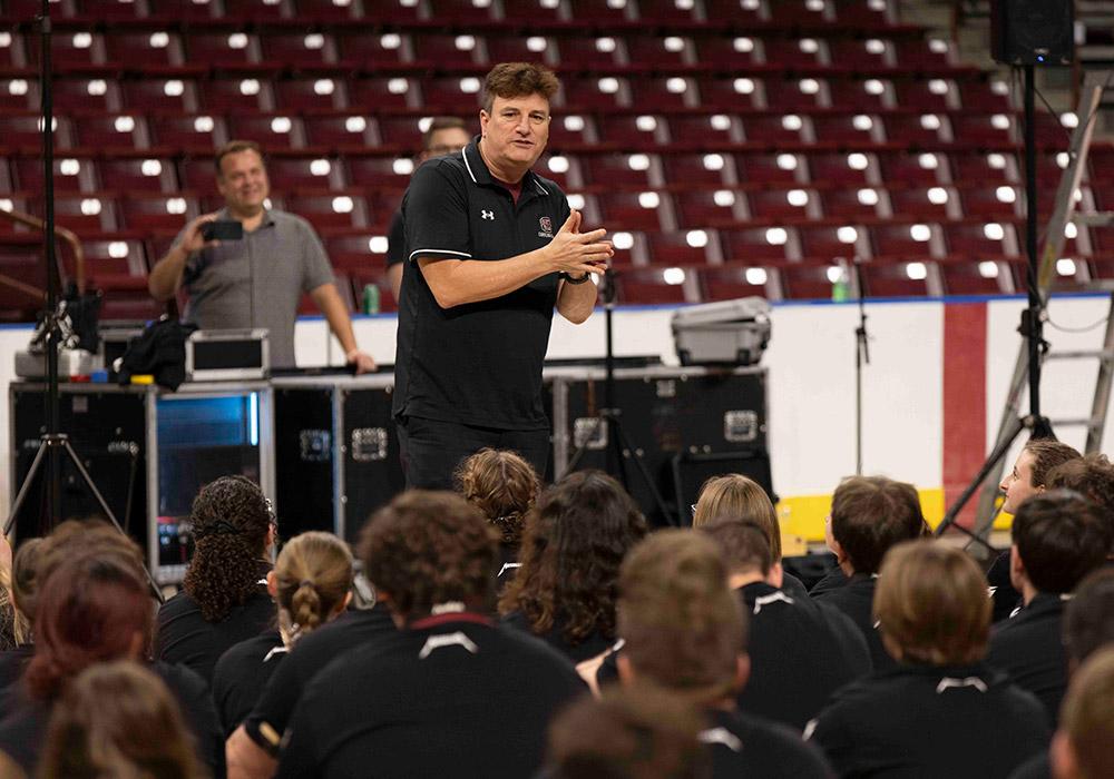 Carolina Band Director Jay Jacobs gets the band pumped before recording J.D. Shaw’s adaptation of Metallica’s “Sad but True.”