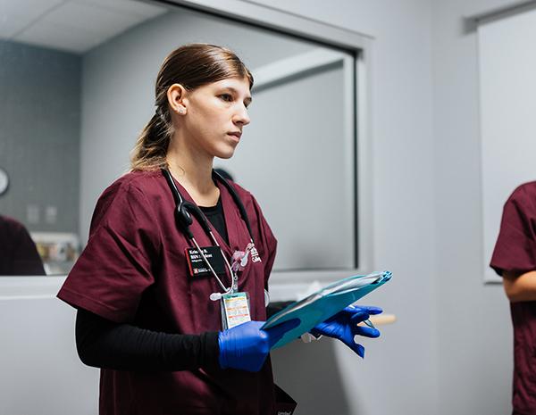 In addition to getting valuable feedback from the standardized patients themselves, the students also are evaluated by a faculty member who monitors their nurse-patient conversations via video cameras in the simulation lab.