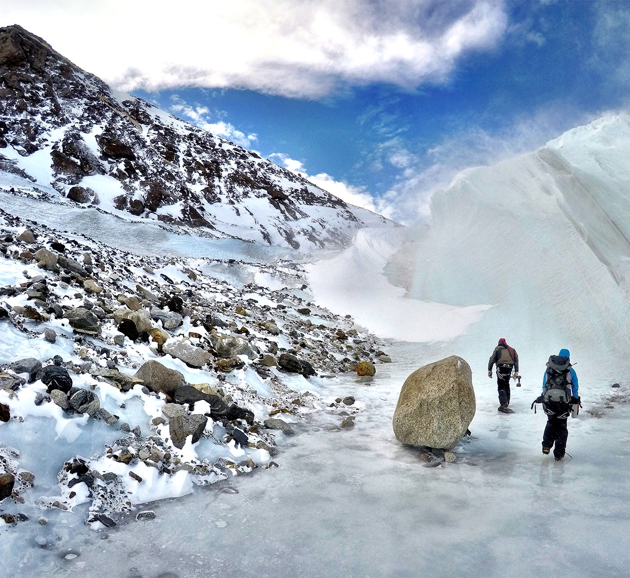 Researchers climb up snowy mountain in Antarctica