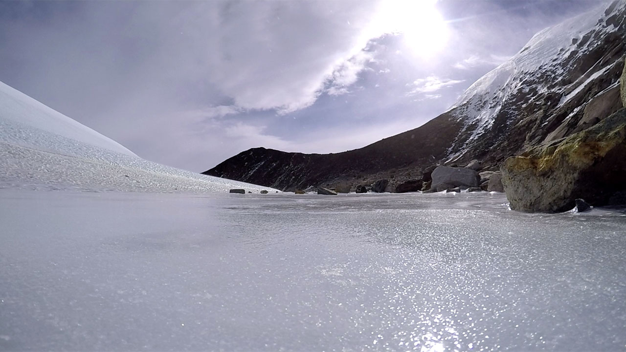 Strong wind blowing snow and ice on the ground in Antarctica.