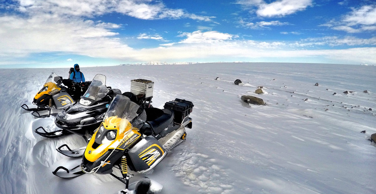 Three Ski-Doo snow machines. Scientists used these vehicles to travel from their base to sampling sites.