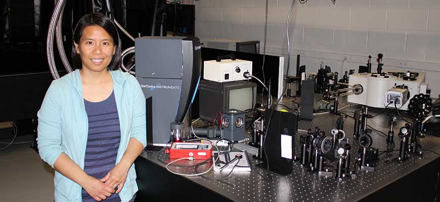 Physics professor Yanwen Wu in her lab