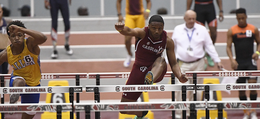 Kaden Briggs jumping hurdles