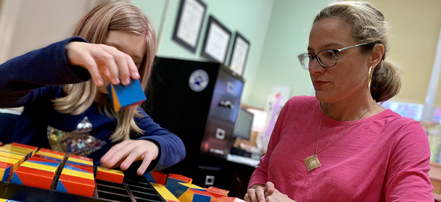 Balthazor works with child in play therapy session