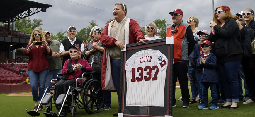 brainard cooper is recognized for his decades of service to the baseball team