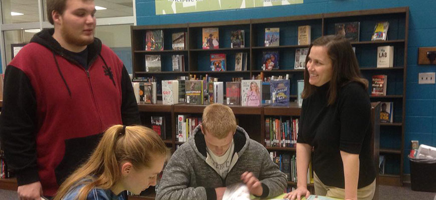 librarian with students at Wren High School