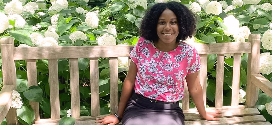 UofSC student Rodrianna Gaddy sits on a bench 