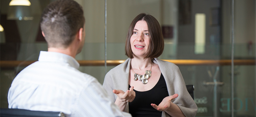 College of Social Work Associate Professor Christina Andrews with student