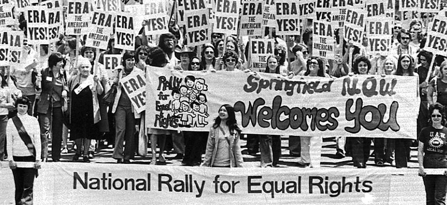 1970s rally of women and men with signs that say ERA Yes 