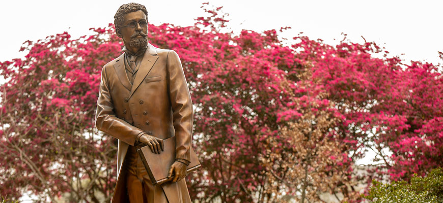 Image of Richard T. Greener statue on campus