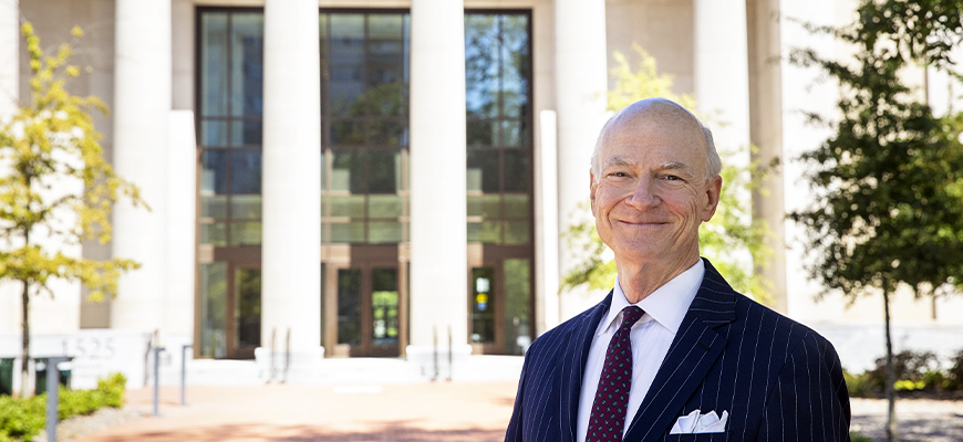 William hubbard stands outside the UofSC school of Law