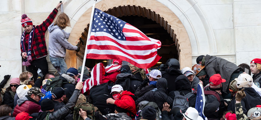 Rioters clash with police as they try to enter the Capitol building on Jan. 6, 2021