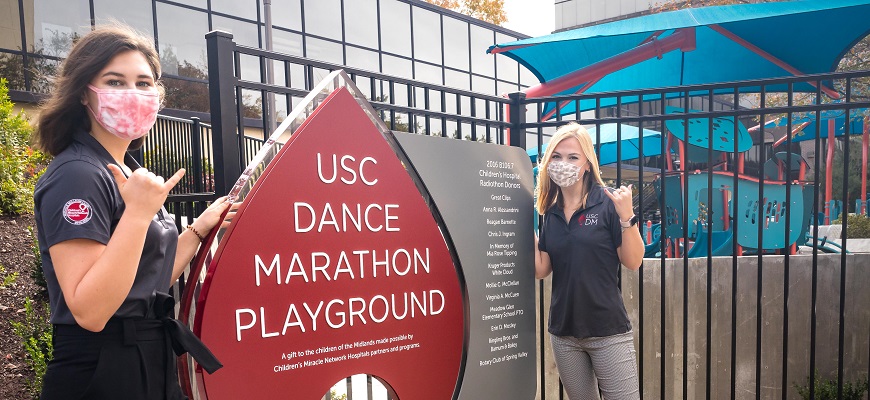 Dance Marathon leaders posing at the UofSCDM Playground at Prisma Health Children's Hospital