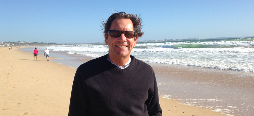 Simon Hudson standing on beach in Portugal