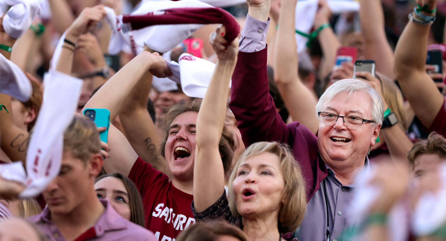 The Amiridises cheer on the Gamecock football team.