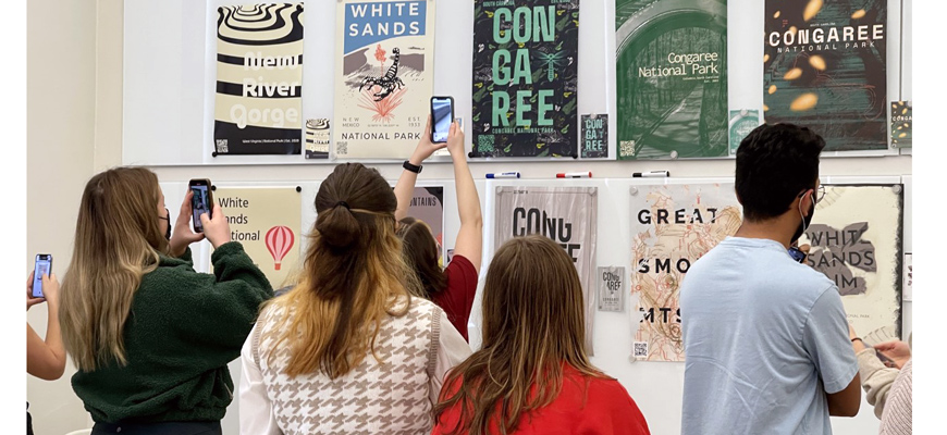 students look at typography exhibit  