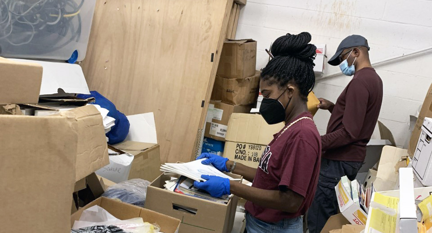 Doctoral candidate and Center for Civil Rights History and Research archivist Constance Caddell processes the SC NAACP records for digitization.