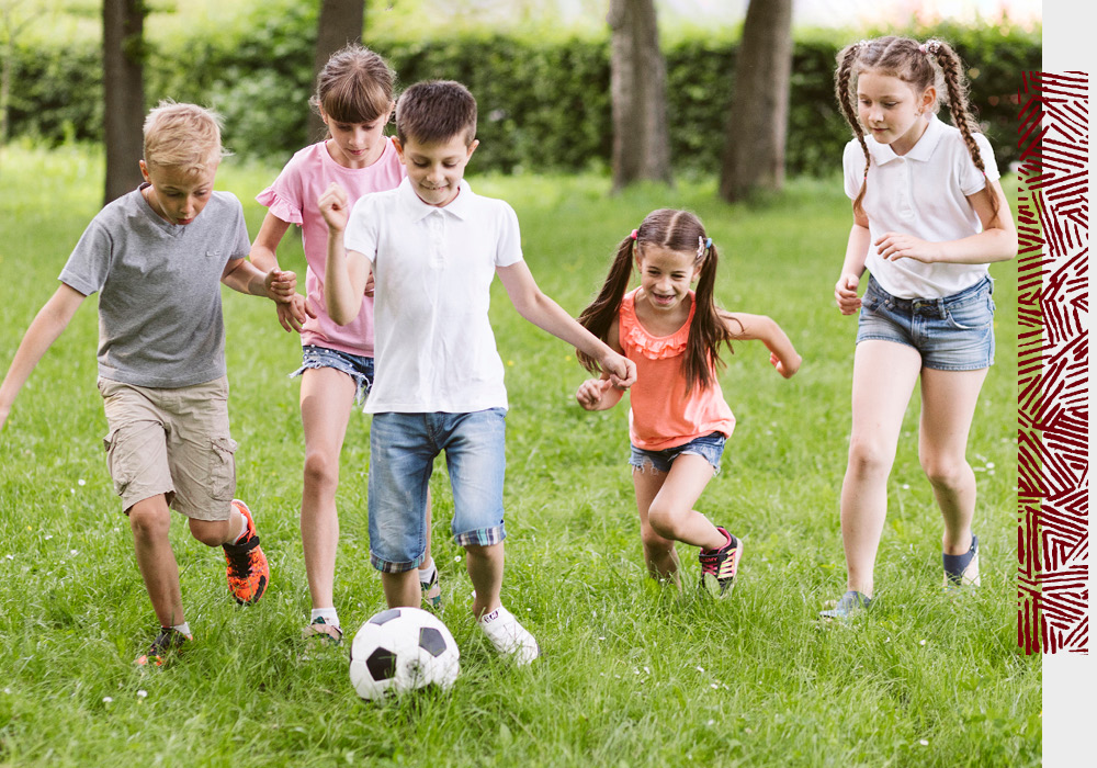 active children playing soccer
