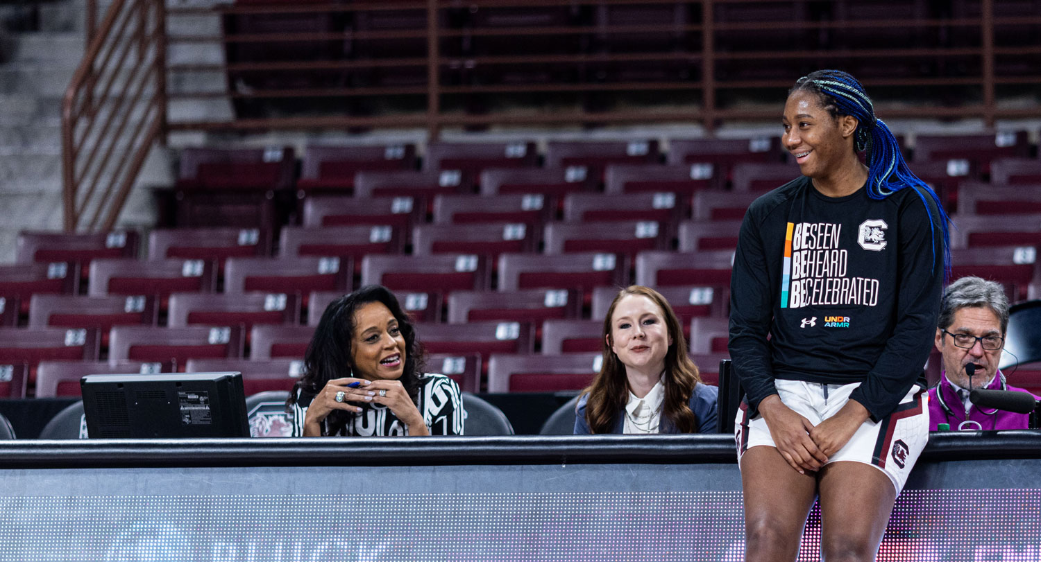 Aliyah Boston talks with media.