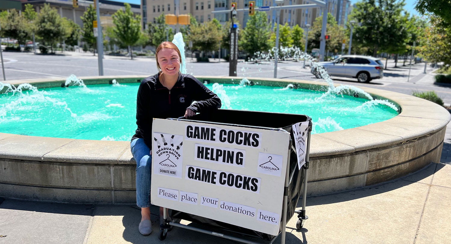 Jenna Wilson poses with Carolina Closets sign.