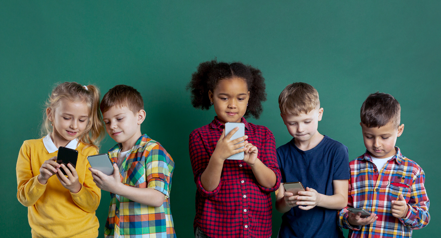 children staring at screens