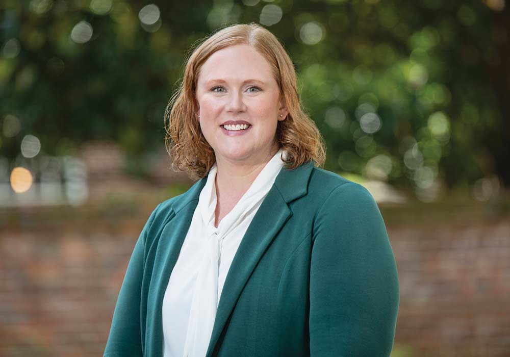 An outdoor portrait of Patti Fabel.