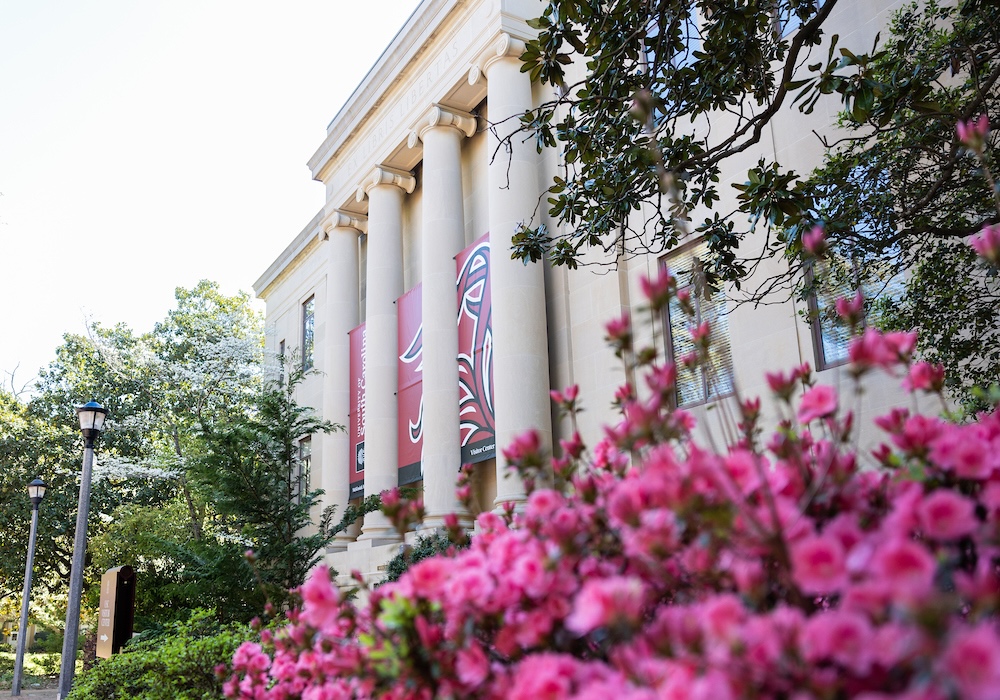 mckissick building in front of pink azaleas