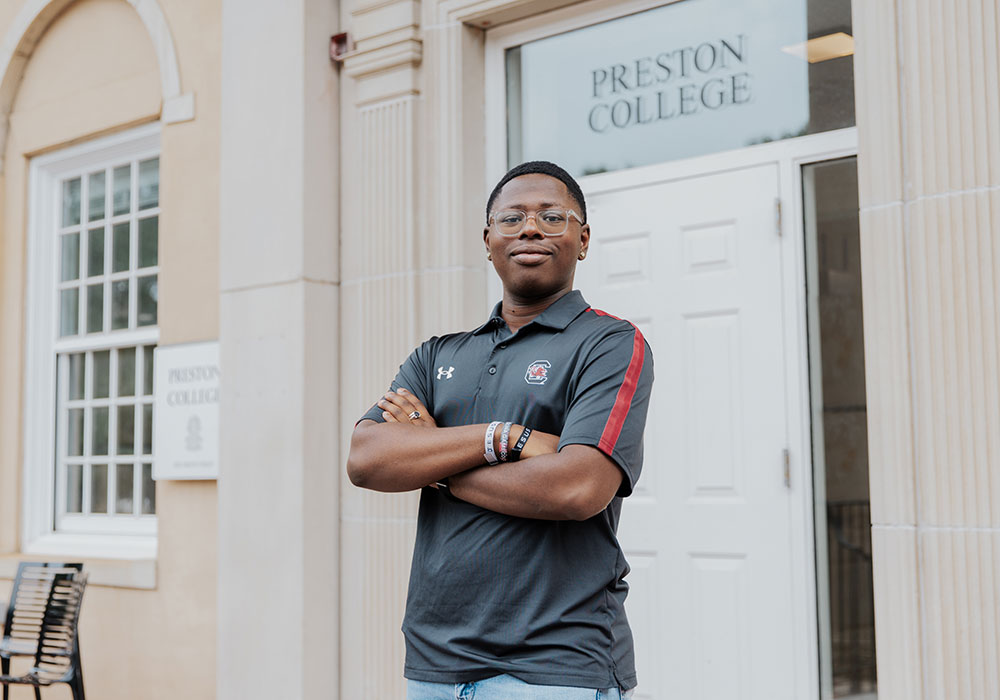 Man with his arms crossed over his chest