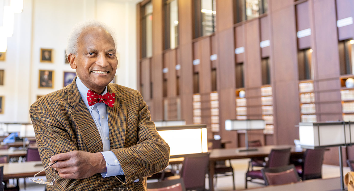 Jim Bowers stands in law school building