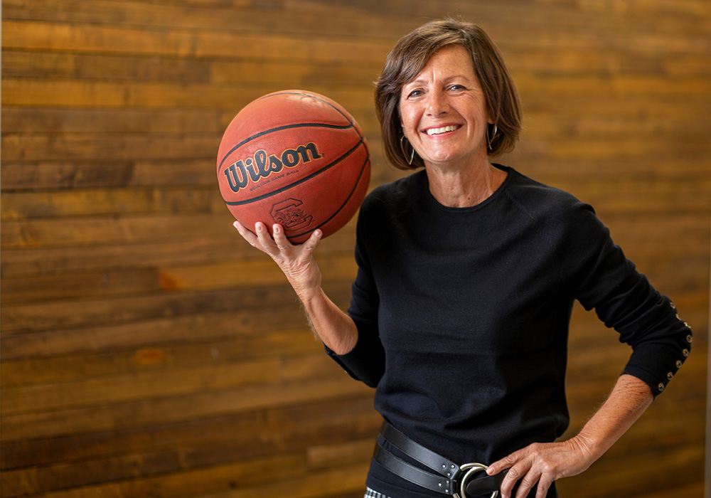 Susan O'Malley portrait holding basketball