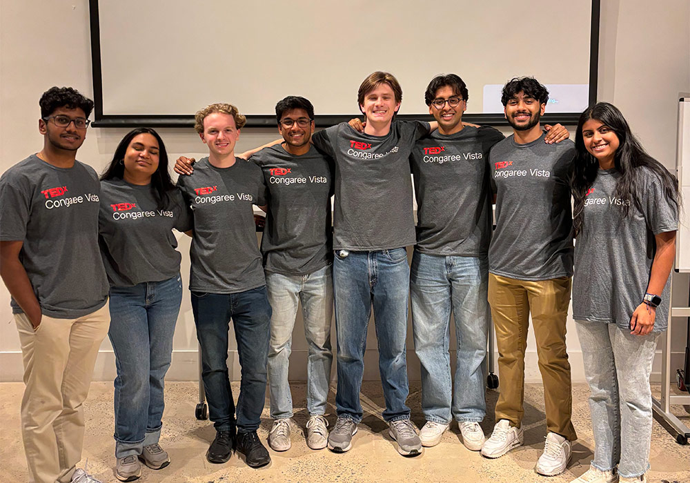 Group of USC students who organized TEDxCongaree Vista stand in a line