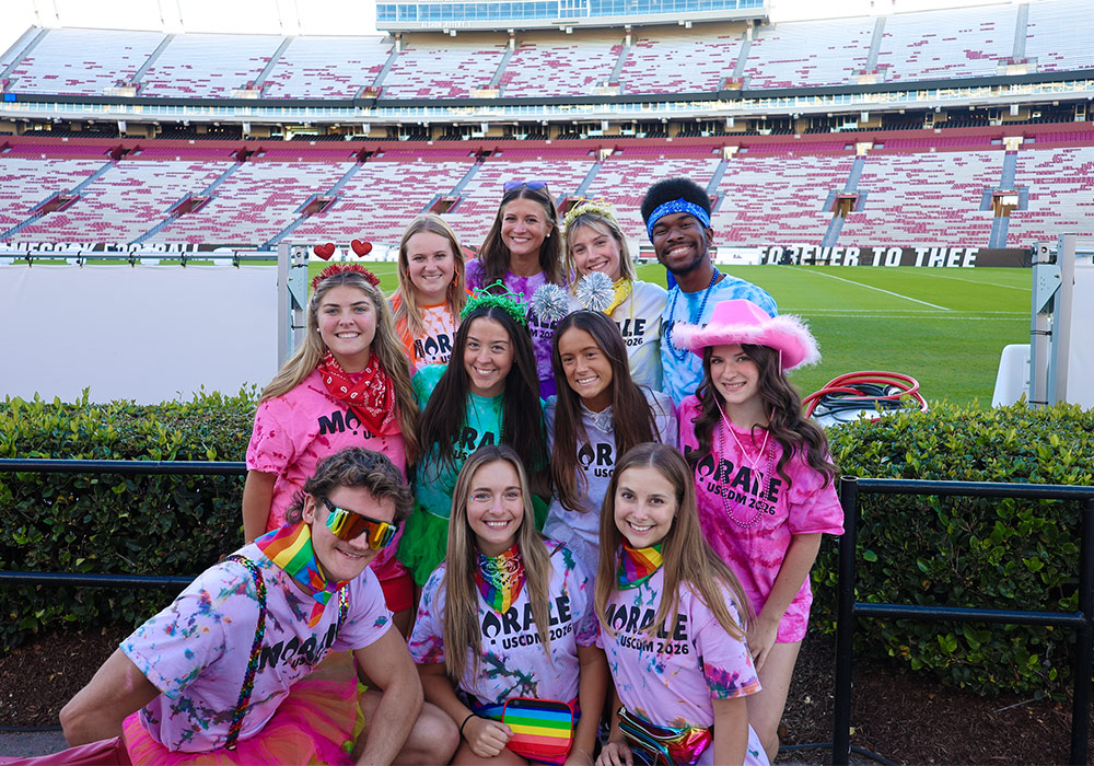 Dance Marathon morale team poses at football stadium