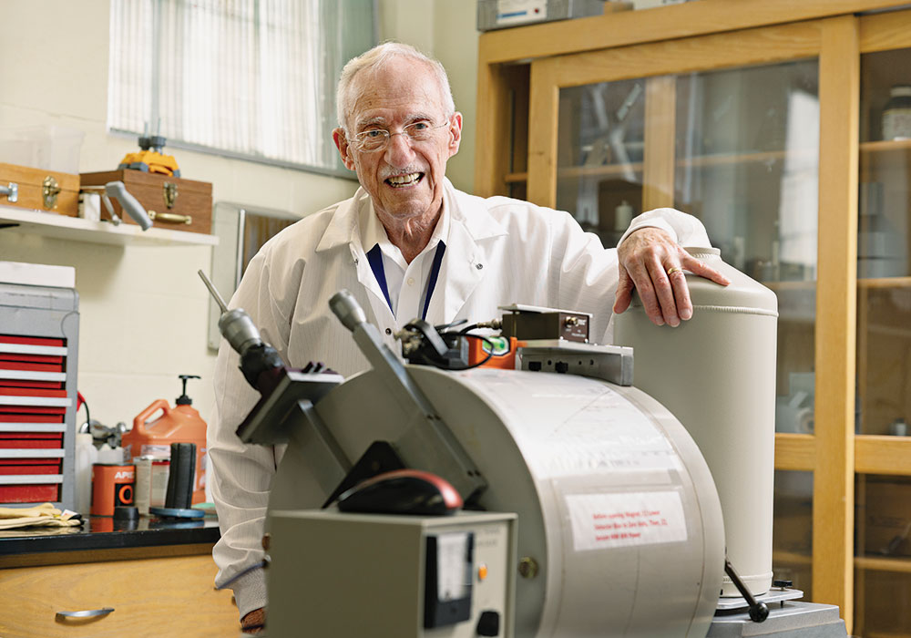 Frank Avignone in his campus laboratory with the Thomas F. Jones Memorial Electron Spectrometer.