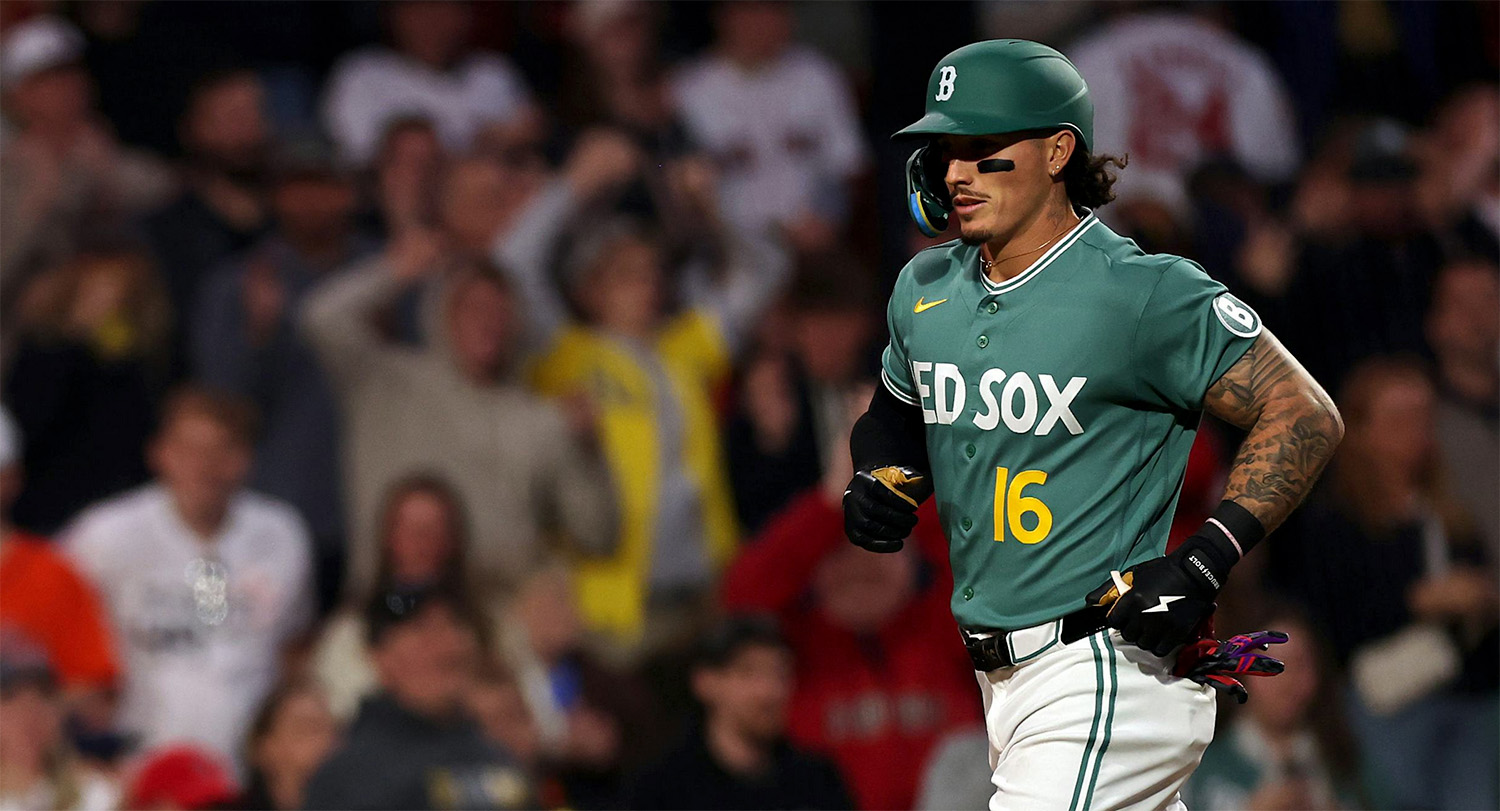 Boston Red Sox player in green Nike-branded uniform with the No. 16 appears wearing batting helmet