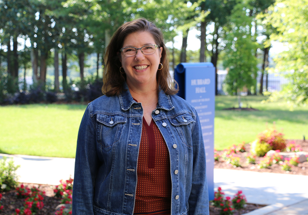 Amy Gerald smiles while standing outside on the USC Lancaster campus