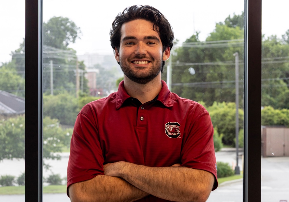 Michael Carson, USC Facilities intern, poses for a picture.