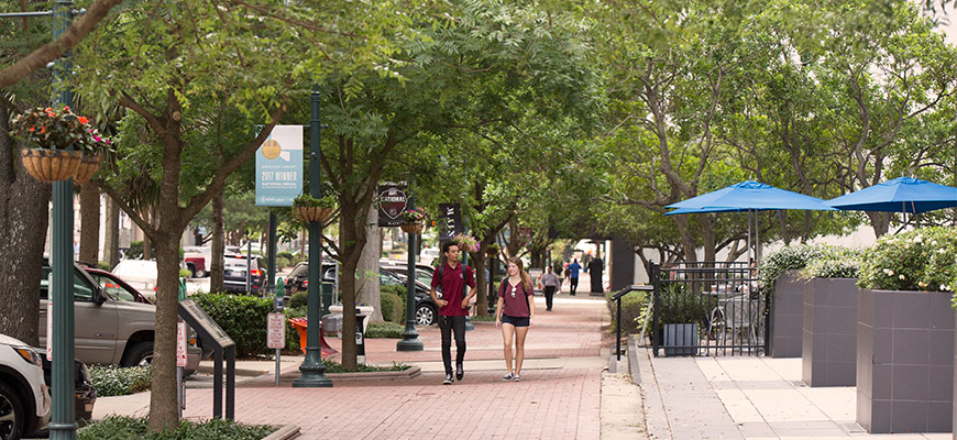 Students walking on Main Street in Columbia.