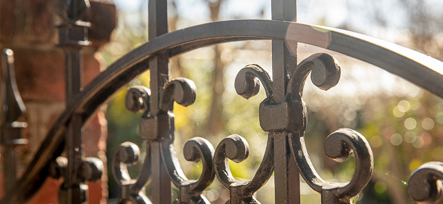A close up of a wrought iron gate near the Horseshoe