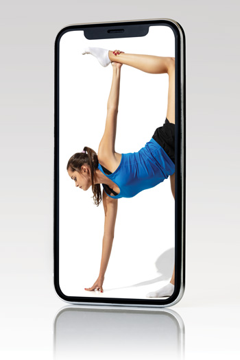 smartphone with screen showing woman doing yoga