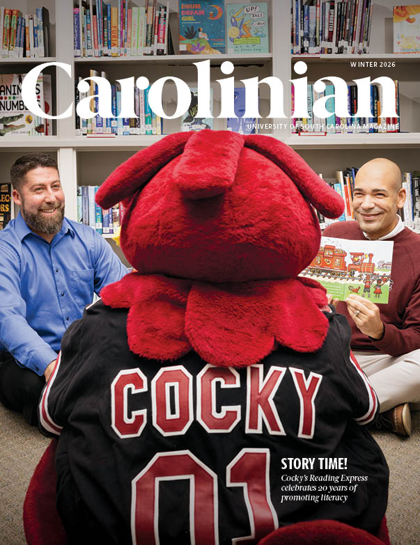 Jamie Ballentine and Tommy Preston read with Cocky.