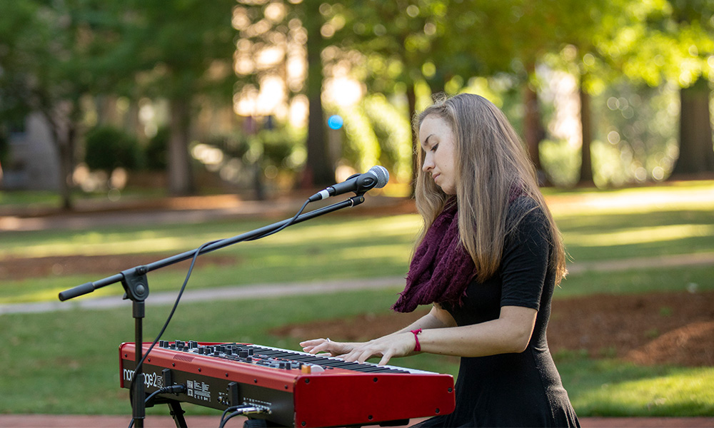 Sarah playing the keyboard