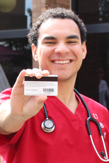 Bradley Quarles shows his ID badge