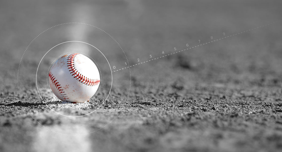 baseball sitting in the dirt