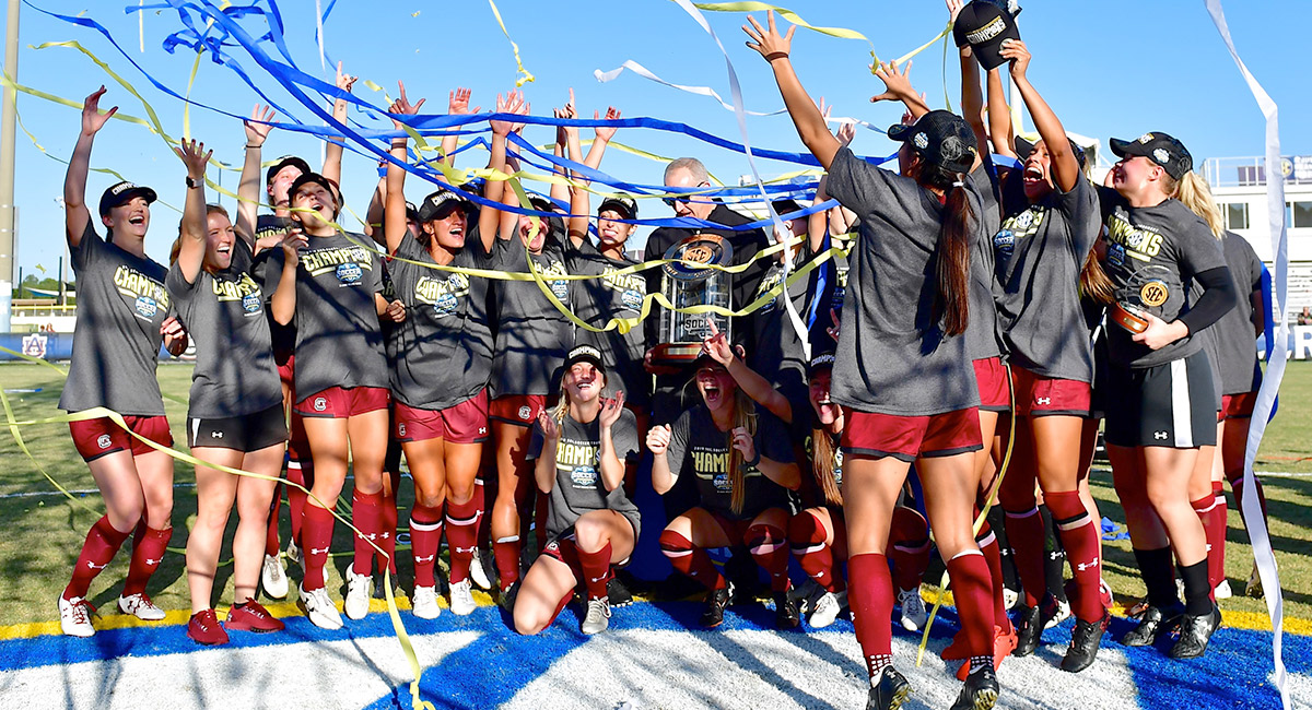 women's soccer team celebrating