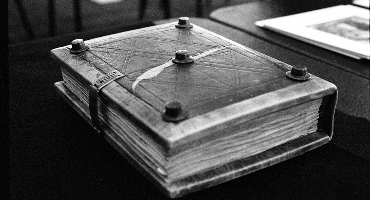 single old book sits on a table