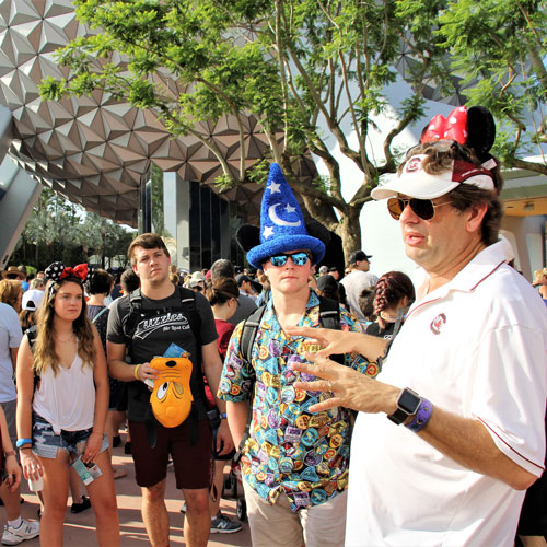 Professor Scott Smith talks to students at Disney