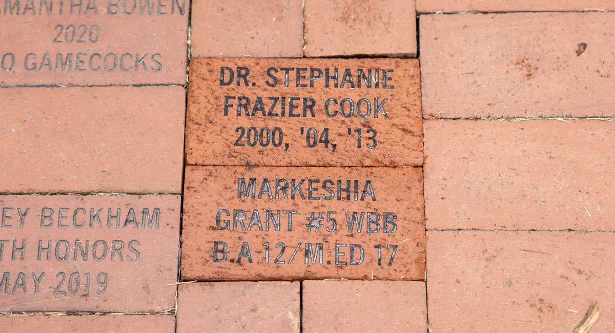 A close up of two bricks. Top says Stephanie Frazier Cook. Bottom says Markeshia Grant
