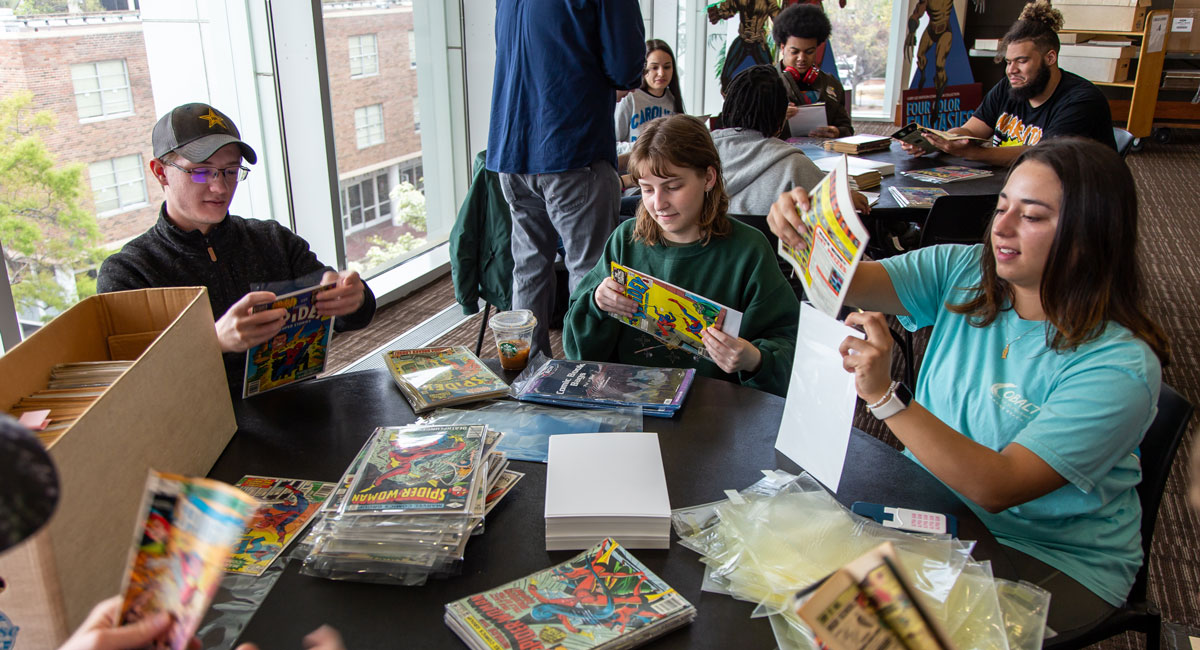 USC students help to process the comic collection 