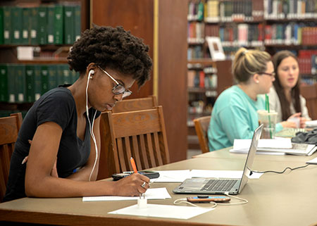 students studying in the library