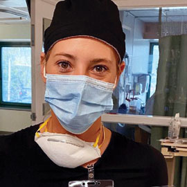 rosina fadul in medical scrubs and mask on a ward in a new jersey hospital